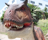 Modèle de dinosaure mécanique animatronique réaliste et personnalisable, type Carnotaurus, avec mouvements simulés, pour les parcs à thème