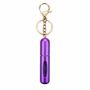 Llavero <span class=keywords><strong>de</strong></span> lujo sencillo con botella <span class=keywords><strong>de</strong></span> perfume, colgante <span class=keywords><strong>de</strong></span> peluche portátil para bolso, bonito decantador <span class=keywords><strong>de</strong></span> perfume <span class=keywords><strong>de</strong></span> 5ml con llavero - Product Image 5