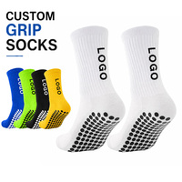 Chaussettes de football antidérapantes personnalisées en polyester et coton respirant, durables et rembourrées, avec grip pour le football