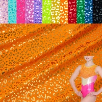 Tissu tricoté en nylon/spandex à imprimé léopard et feuille d'or métallique, extensible dans les quatre sens, pour maillots de bain, jupes de danse et vêtements de performance