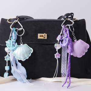 2026 Superventas Serie Oceánica de Verano: Llavero y Colgante para Bolso de Cuero PU con Diseño de Concha y Ancla de Barco de Acrílico, para Colgar en Mochilas Escolares de Estudiantes - Product Image 1