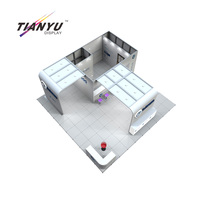 Boîte lumineuse d'exposition Tianyu 10x10 en tissu tendu personnalisé, équipement créatif Aura pour conférences et événements duo