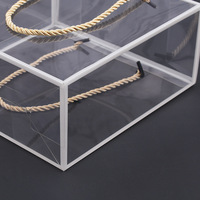 Fabricants chinois CSMD, vente en gros de boîtes d'emballage cadeau en plastique transparent en PET à prix avantageux avec poignée torsadée dorée
