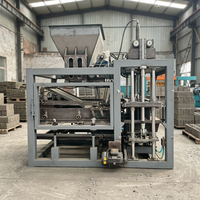Machine automatique de fabrication de blocs de pavés QT4-15 avec moteur PLC, ligne de production de briques creuses en béton avec alimentateur, mélangeur et empileur