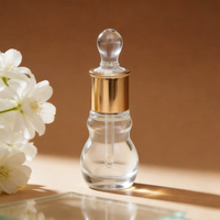 Vente en gros de flacons compte-gouttes en verre transparent personnalisables de 6 ml et 12 ml, en forme de gourde, pour huiles essentielles, avec bouchons compte-gouttes à col doré
