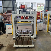 Machine de fabrication de briques creuses en ciment et béton de haute qualité QTJ4-40, modèle manuel pour pavés, idéale pour l'Afrique