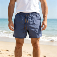 Shorts de bain pour hommes en gros, délavés à la pierre, couleur unie, style vintage délavé, avec cordon de serrage en chanvre, pour la plage et le surf estival