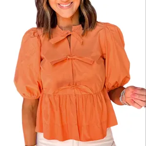 2024批发别致服装定制女性夏季葡萄柚橙色打结粉扑短袖荷叶边衬衫