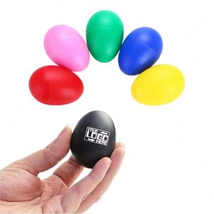 Maracas à percussion personnalisables avec logo, instruments de rythme pour enfants d'âge préscolaire, remplisseurs de paniers de Pâques, instruments sonores pour la classe - Product Image 1