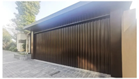 ATMOS Maison de luxe encastrée Porte de garage sectionnelle électrique aspect bois Grain 16X7 à latte Moderne