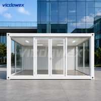 VICDOWEX - Showroom en conteneur préfabriqué - Mur-rideau en verre - Design contemporain - Modulaire - Préfabriqué - Pour immeuble de bureaux - Entrepôt