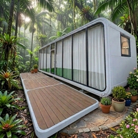 Cabane modulaire intelligente en acier, étanche, avec structure en acier, style pod spatial, dotée de vitres panoramiques, pour hôtel de luxe, resort et glamping.