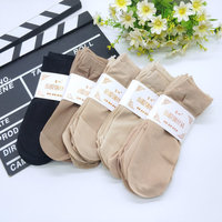 Vente en gros Chaussettes ultra fines d'été couleur marron couleur peau nue noires Chaussettes transparentes ultra fines pour femmes