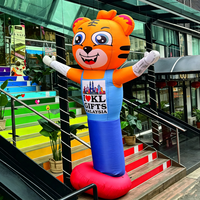 Mascotte gonflable personnalisée en tissu Oxford résistant à l'eau, motif Tigre agitant la patte, pour publicité commerciale et événements.