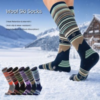 Chaussettes de ski en laine mérinos pour hommes et femmes, épaisses, avec semelle en tissu éponge, au-dessus du genou, pour le snowboard, chaudes, pour la randonnée en plein air
