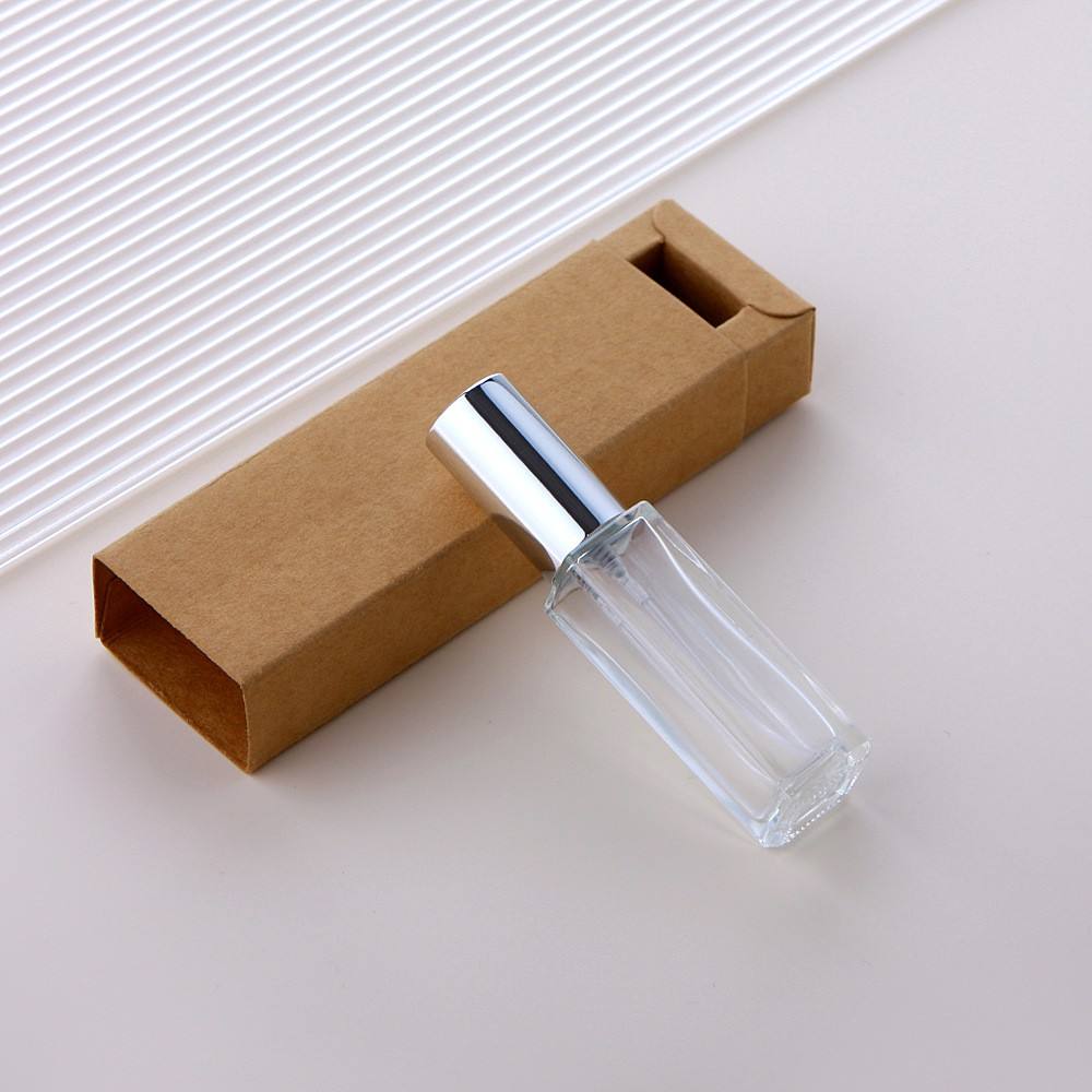 Clear glass spray bottle + silver cap + brown box