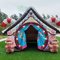 Tente gonflable de Noël en forme de maison de pain d'épices, Grotte gonflable du Père Noël, Maison de bonbons avec bonhomme de pain d'épices, Maison gonflable de Noël