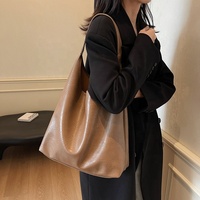 Sac fourre-tout à fermeture éclair en PU de style français vintage pour le travail des femmes sac à bandoulière à sangle unique à la mode de grande capacité de style coréen