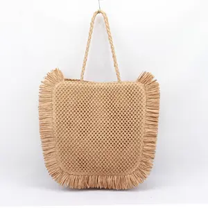 High quality natural paper grass beach bag with hollowed out design for summer vacation tourism, seaside leisure shoulder bag
