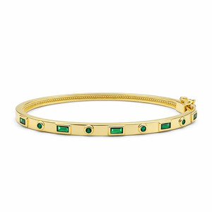 Bracciale rigido in oro con castone di smeraldi - Product Image 1