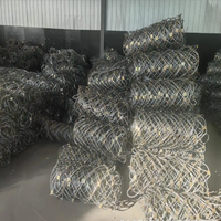 Système de protection passive des pentes par filet de protection contre les roches enroulées en câble métallique flexible à technique de tissage SNS, barrières contre les chutes de pierres et les débris