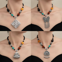 Collier Pendentif Rotatif Porte-Bonheur en Graine de Bodhi Vintage pour Femme, en Argent Tibétain et Ambre, Chaîne de Pull Réglable – Vente en Gros