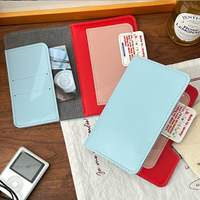 Porte-passeport en cuir PU bicolore avec emplacements pour cartes, organiseur de passeport portable, étui de voyage pour passeport