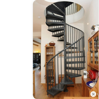 Escalier en colimaçon moderne et peu encombrant en acier au carbone pour appartement résidentiel