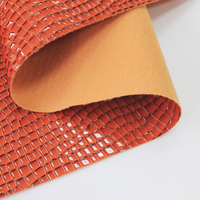 Rouleau de cuir PVC à motif de pierre concave à haute brillance, cuir pour sac à main, matériau de revêtement en cuir