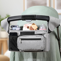 Organisateur de poussette double avec porte-gobelet, dragonne amovible, capacité moyenne, en polyester résistant à l'eau, fermeture éclair, sac de rangement pour bébé