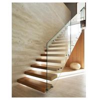 Escalier suspendu minimaliste avec support invisible en acier carbone et éclairage LED d'ambiance, sur mesure pour résidence en immeuble de grande hauteur