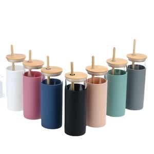 Vaso de vidrio con tapa de bambú y pajita, funda de silicona resistente al calor, taza de viaje en varios colores - Product Image 1