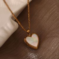Collier pendentif médaillon commémoratif en forme de cœur en acier inoxydable et coquillage naturel, tendance - Pendentif à ouverture et fermeture