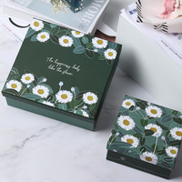Nouveauté 2024 : Coffret cadeau cosmétiques (rouge à lèvres) motif petite marguerite, avec revêtement UV gaufré et emballage grand format ciel et terre