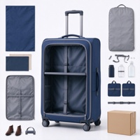 Valise à roulettes souple bleu marine avec deux poches frontales zippées, poignée télescopique et poignée latérale
