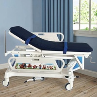 Lit de transfert hospitalier pédiatrique réglable avec support de perfusion, construction métallique, design moderne, pliable, avec roulettes de guidage