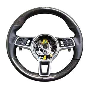Volante de Cuero con Perforaciones de Carbono para <span class=keywords><strong>Porsche</strong></span> Cayman, Cayenne, Panamera, <span class=keywords><strong>Macan</strong></span>, Taycan, 718, 911, 955, 958, 970, 971, 991 - Product Image 1
