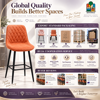 Tabouret de bar en cuir orange matelassé avec dossier en losanges, quatre pieds en métal noir, repose-pieds, hauteur de comptoir