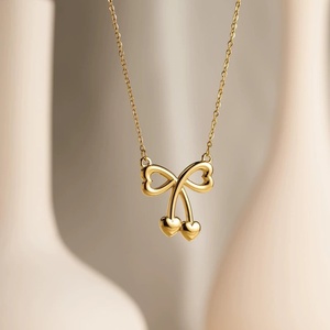 Collar Minimalista de Acero Inoxidable con Colgante de Lazo y Corazón Chapado en Oro de 18K, Diseño Hueco de Amor, Regalo para Mujer, Resistente al Agua - Product Image 5