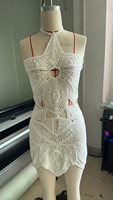 STOCK Robe en crochet découpée à col licou Femmes été Mini Robe tricotée Vêtements de plage