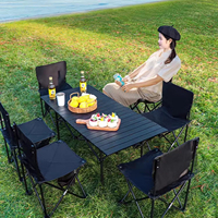 Table pliante portable ultra légère au design moderne pour les repas en plein air, les hôtels, le camping, les barbecues et les pique-niques.