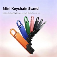 Nouveau support de bureau magnétique en alliage d'aluminium avec réglage de hauteur, support de téléphone portable mini pliable et portable, et porte-clés