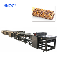 Ligne de production automatique de barres de riz, de flocons d'avoine, de cacahuètes, de snacks nutritionnels, de barres énergétiques protéinées au chocolat et à l'avoine