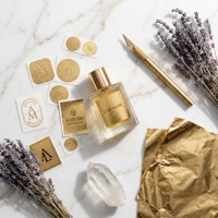 Étiquettes autocollantes holographiques personnalisées en feuille d'or durable pour flacons de parfum et emballages cosmétiques étanches