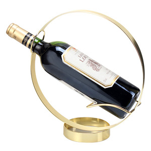 Venta al por mayor de fábrica, decoración de fiesta, estantes de exhibición de botellas de <span class=keywords><strong>vino</strong></span> circulares de hierro, soporte de botella de <span class=keywords><strong>vino</strong></span> de Metal único, Círculo - Product Image 1