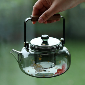 Tetera de vidrio de borosilicato engrosado con tapa, resistente al calor, para preparar té en el hogar, apta para calentar en estufas eléctricas y de cerámica. - Product Image 2