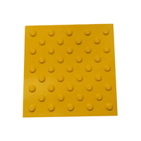 Carreaux de pavage tactiles en caoutchouc PVC TPU auto-adhésifs de haute qualité bandes indicatrices circulaires pour carreau de pavage tactile de tapis de route aveugle