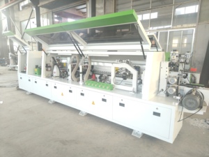 เครื่องจักรปิดขอบแผ่นไม้แบบอัตโนมัติ JUNDE 17.5KW สำหรับงานอุตสาหกรรม พร้อมระบบกัดแต่งขอบสองด้าน สำหรับขาย - Product Image 4
