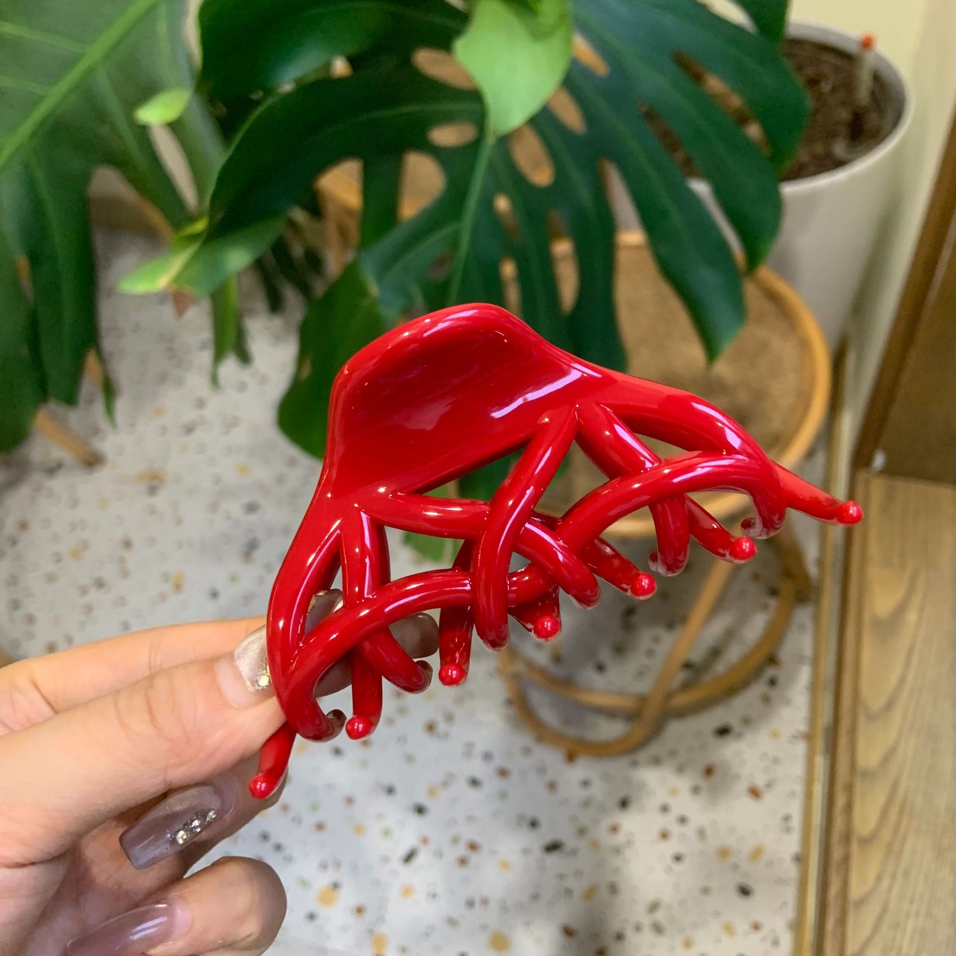 Rouge-papillon boucle phénix queue