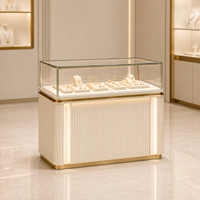 Vitrine de Luxe pour Bijoux avec Éclairage LED, Tiroirs de Rangement, Meuble de Comptoir Îlot Blanc Lait Doré pour Vente au Détail